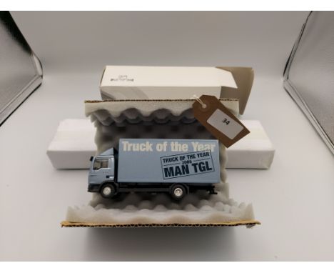 Manufacturer  - Conrad | Description - MAN TGL - Truck of the year 2006 | Stock Code - 67152/01 | Notes - Good - Box slight w