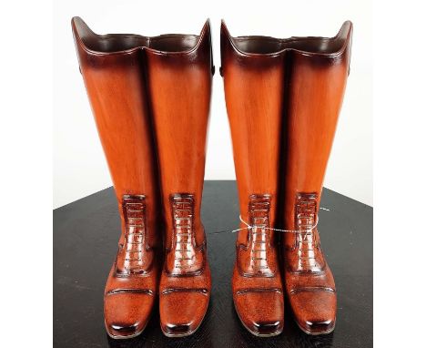 FAUX RIDING BOOTS STICK STANDS, a pair, polychrome resin, 48cm H. (2) 