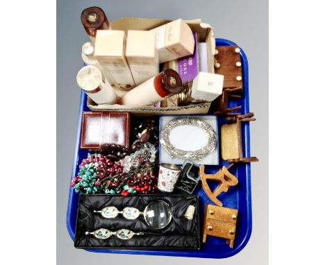 A tray containing beaded necklaces, doll's house furniture, Rotary wristwatch box, boxed letter opener and magnifying glass, 