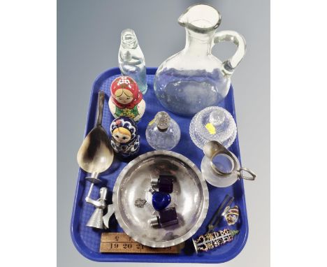 A tray containing folding boxwood rule, cut glass dressing table perfume bottle with silver rim, Russian nesting dolls, tunin