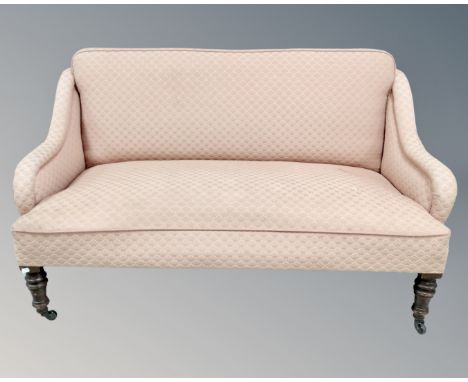 A Victorian two seater sofa.