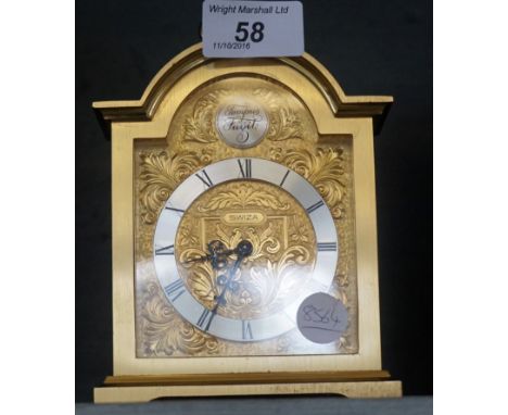 A good quality Swiza tempus fugit brass framed alarm clock.