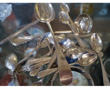 A mixed group of hallmarked silver items to include two sets of six hallmarked silver tea spoons, ladle, Georgian London hall