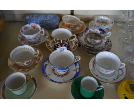 A mixed lot of 19th Century and later cups and saucers to include Royal Crown Derby 1128, Royal Doulton, Royal Copenhagen, ea
