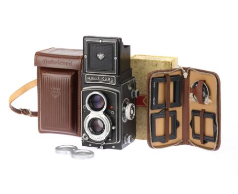 A Rollei Rolleicord Va Medium Format TLR Camera, black, body G-VG, shutter working, optics F-G, some light haze &amp; fungus 