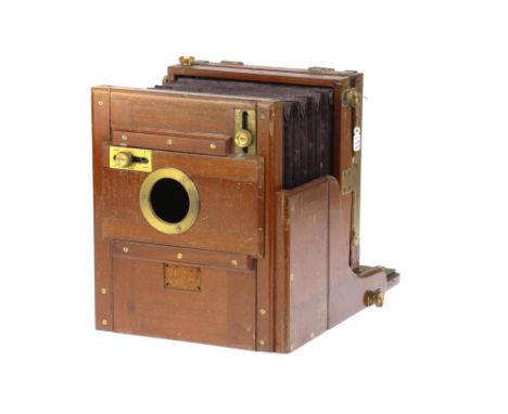 A Meagher Mahogany &amp; Brass Half Plate Tailboard Camera, body F, well worn, ground glass P, cracked, bellows P, well worn 