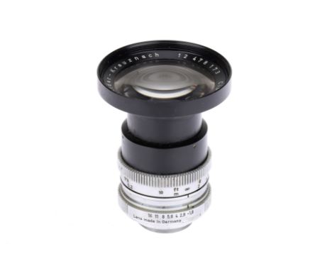 A Schneider-Kreuznach Cinegon f/1.8 10mm Camera Lens, body F, built up dirt, optics F, some haze present,