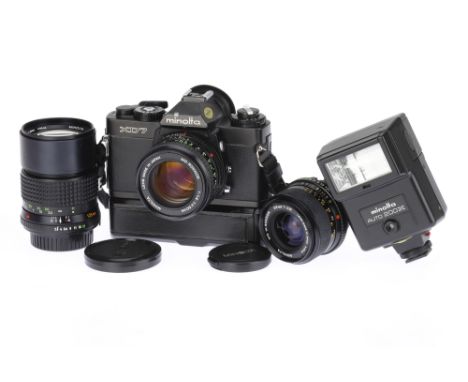 A Minolta XD7 35mm SLR Camera Outift, black, body G-VG, shutter with issues, working on X &amp; B, all other speeds shutter s