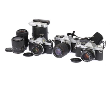 Three 35mm SLR Cameras, to include an Olympus OM10, body G-VG, shutter working, together with a Zuiko MC Auto-S f/1.8 50mm le