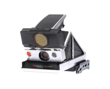 A Poalroid SX-70 Land Camera Sonar Auto Focus Instant Folding Camera, chrome, body G-VG, shutter untested, some light corrosi
