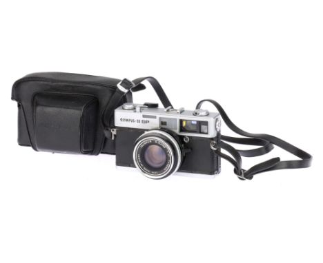 An Olympus-35 SP 35mm Rangefinder Camera, chrome, body G, shutter working, meter untested, optics G, some light haze present,