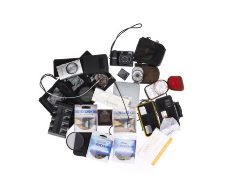 A Collection of Two Compact Cameras and Various Accessories comprising a Canon Powershot A1300 compact digital camera, powers
