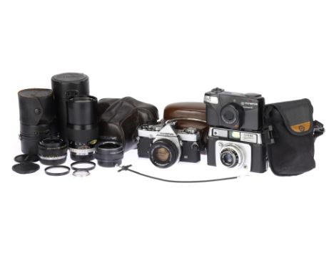 An Olympus OM-1 MD 35mm SLR Camera with Three Lenses chrome, 1974-79, serial no.1463634, body G but with scuff to baseplate, 