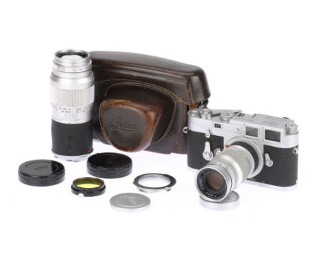A Leica M3 Rangefinder Body, chrome, serial no. 1077694, body, F-G, shutter working but slow speeds inaccurate, together with