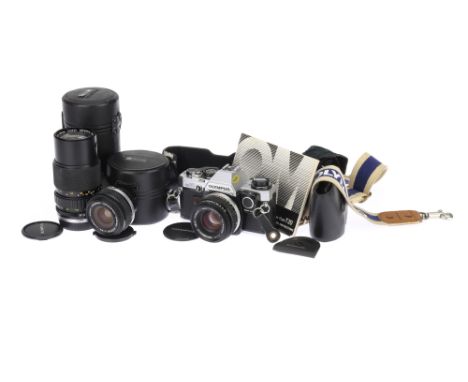 An Olympus OM10 35mm SLR Camera Outfit, chrome, body F, shutter not working correctly, with manual adapter, together with a Z