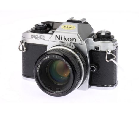 A Nikon FG-20 35mm Film SLR Camera, with Nikon Ai Nikkor f/1.8 50mm lens, body, VG, shutter working, lens, VG