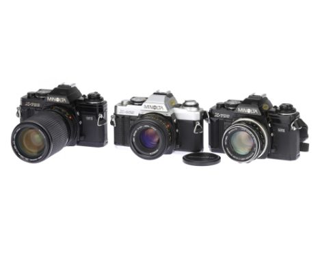 Three Minolta X Series 35mm SLR Cameras, to include a Minotla X-700, black, not responding when batteries are inserted, with 