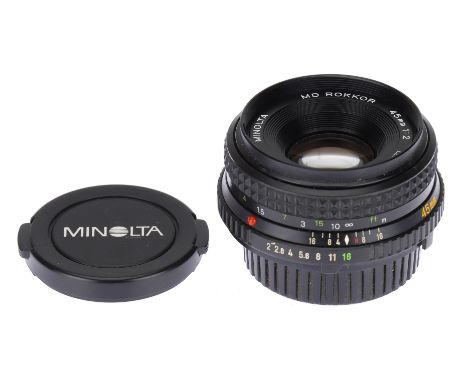 A Minolta MD Rokkor f/2 45mm Camera Lens, black, body G, optics F-VG, some haze to inside of rear element, otherwise VG, with