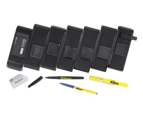 A Selection of Nikon 35mm Camera Film Doors, together with a Nikon F Photomic front plate (a lot)