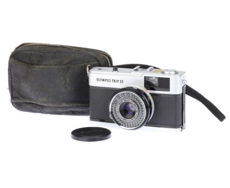 An Olympus Trip 35 35mm Viewfinder Camera, chrome, body G-VG, shutter working, aperture value changes depending on volume of 