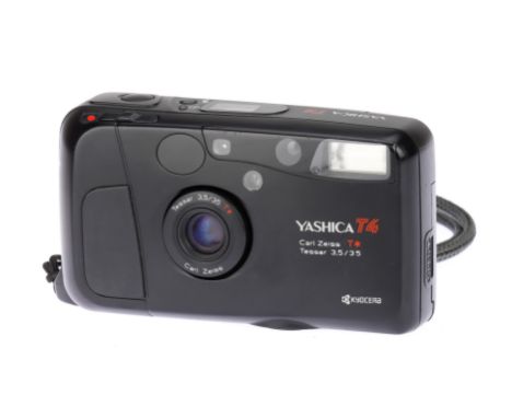 A Yashica T4 Compact 35mm Camera, with Carl Zeiss Tessar T* f/3.5 35mm lens, body, G-VG, powers up and takes a photo, not tes