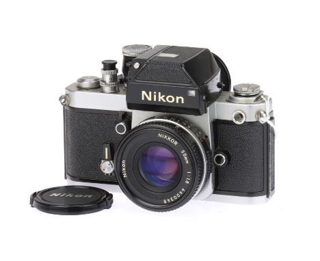 A Nikon F2 Photomic 35mm SLR Camera, chrome, serial no. 7209788, with Nikon Ais Nikkor f/1.8 50mm lens, body, F-G, shutter wo