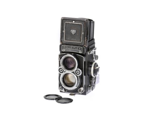 A Rollei Rolleiflex 2.8 F Medium Format TLR Camera, black, serial no. 2444816, body G, shutter working, well used, damage to 