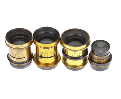 Four Brass Bodied Camera Lenses, to include a W. Watson &amp; Sons 8½ x 4¾ lens, optics G-VG, some haze present, also with an