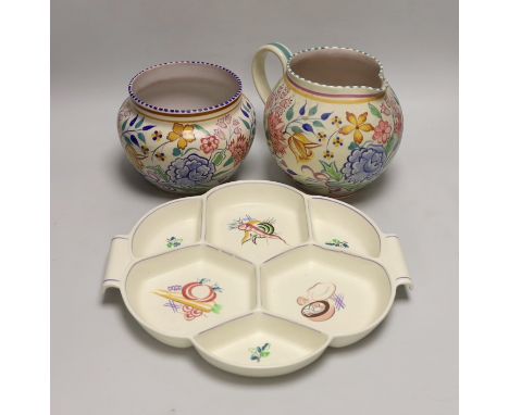 A Poole pottery tulip floral vase and jug and an hors d'oeuvre dish