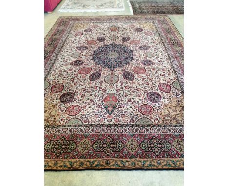 A Persian style machined carpet, 365 x 276cm