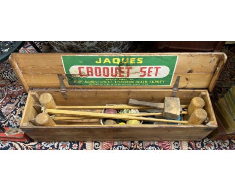 A vintage pine cased Jacques croquet set