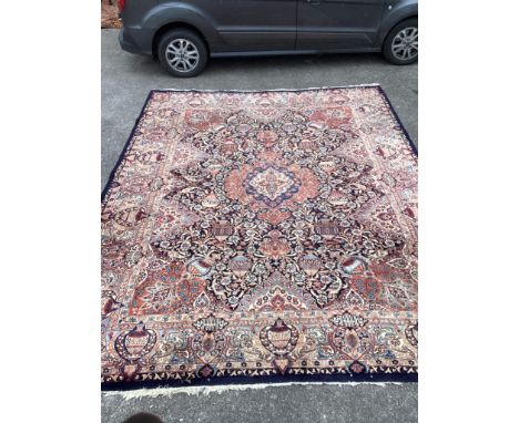 A Tabriz blue ground carpet, 390 x 290cm