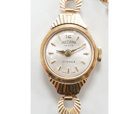 A lay's 9ct gold Medana manual wind wrist watch, on a 9ct gold bracelet, gross weight 12.2 grams.