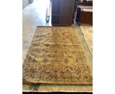 A North West Persian style gold ground carpet, 254 x 170cm