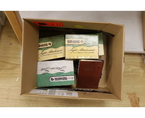 A boxed View-Master model C stereo set, three light attachments with original boxes, a loose light attachment and a View-Mast
