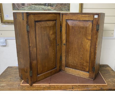 A 19th century brass mounted teak campaign trunk, length 76cm, depth 45cm, height 53cm