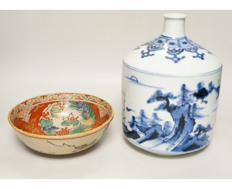 A large Japanese Arita blue and white sake flask and a Kutani bowl, largest 26cm tall