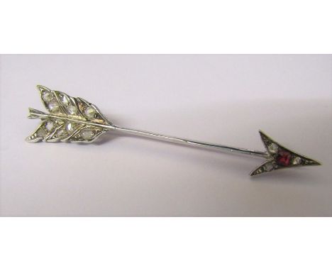 Tested as 9ct gold and diamonds arrow brooch with red stone L 6 cm weight 3.7 g