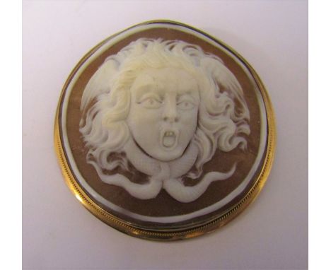 9ct gold cameo brooch depicting bust portrait of Medusa, with pendant fastener D 4.5 cm total weight 8.3 g