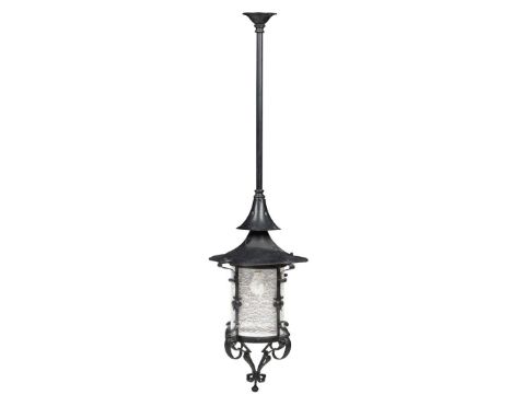  ENGLISH ARTS & CRAFTS HALL LANTERN, CIRCA 1900 patinated wrought iron with frosted glass shield&nbsp; 140cm high&nbsp;   