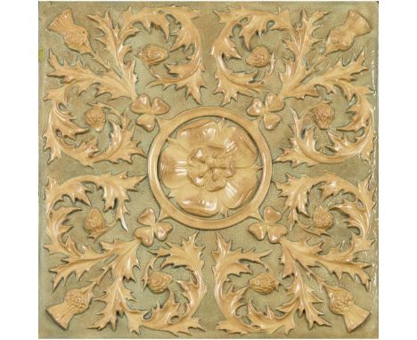  ATTRIBUTED TO BURMANTOFTS POTTERY THISTLES, SHAMROCKS & ROSE RELIEF TILE, CIRCA 1890 glazed earthenware 41cm square Provenan