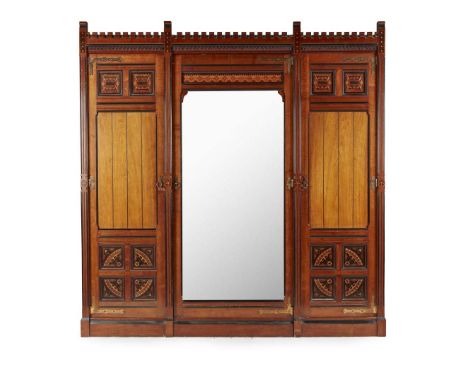  ATTRIBUTED TO CHARLES BEVAN (1815-1891) FOR MARSH, JONES AND CRIBB REFORMED GOTHIC BEDROOM SUITE, CIRCA 1875 walnut, with ma