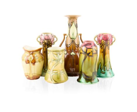  MINTONS LTD. GROUP OF 'SECESSIONIST' WARES, CIRCA 1907 relief moulded and glazed earthenware comprising; a VASE, painted mak