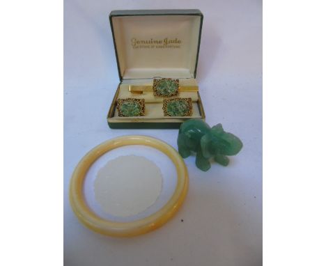 Collection of jade, cufflinks, carved elephant etc