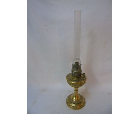 Antique brass oil lamp with glass funnel