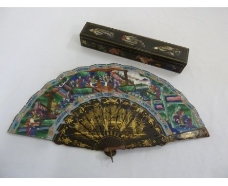 Chinese 20th century lacquer fan decorated with figures within architectural settings in original fitted case