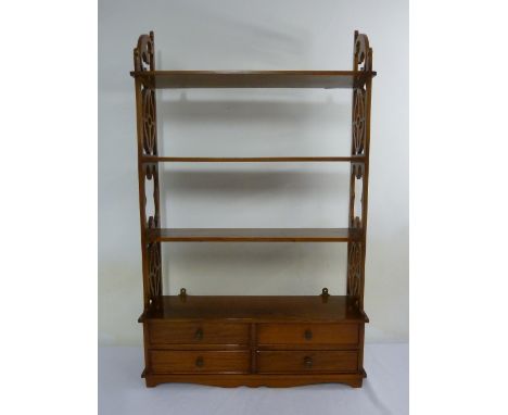 Mahogany wall shelf with four drawers and scroll pierced sides