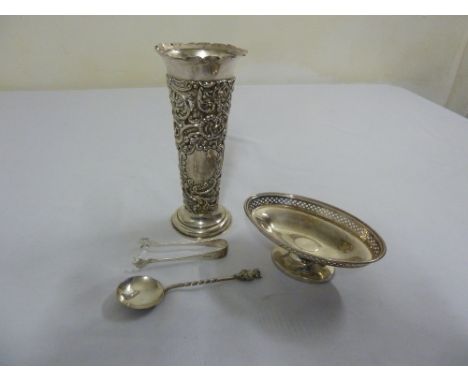 A quantity of hallmarked silver to include a vase with removable glass liner, an oval bonbon dish on raised circular base, a 