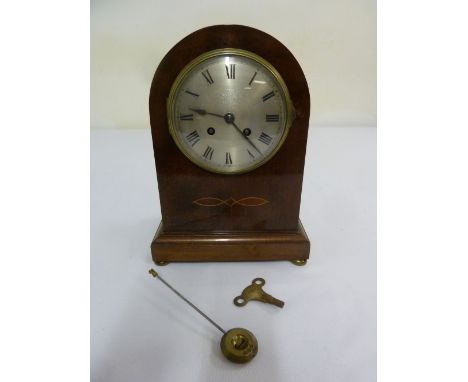Edwardian arched top mantle clock, two train movement, silvered dial Roman numerals, to include key and pendulum