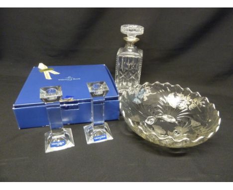 A pair of Villeroy and Boch glass table candlesticks in original packaging, a cut glass decanter with silver collar and a gla